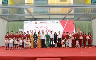 Teachers and students at the school opening ceremony.