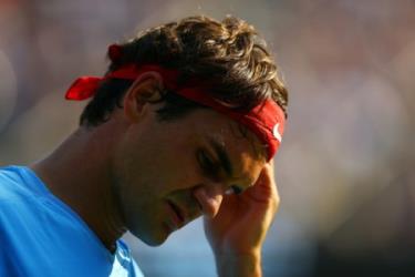 Federer bất ngờ phải dừng buớc ở tứ kết US Open. Ảnh: Zimbio
