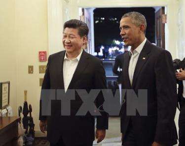 Tổng thống Mỹ Barack Obama (phải) và Chủ tịch Trung Quốc Tập Cận Bình.