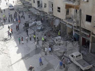 Cảnh đổ nát sau một trận không kích của quân đội chính phủ Syria nhằm vào phiến quân tại thành phố Ariha, tỉnh Idlib ngày 19/9.