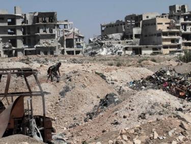 Nhà cửa bị phá hủy tại thành phố Aleppo, miền bắc Syria ngày 12/9.