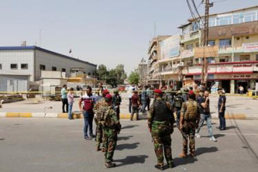 Lực lượng an ninh Iraq có mặt tại hiện trường vụ nổ bom ở Jadida, Baghdad hôm 27/9.