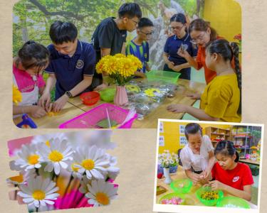 Các học viên Trung tâm S.E.E.D Center Yên Bái học nghề handmade làm hoa giấy, hoa cài áo, dây buộc tóc...
