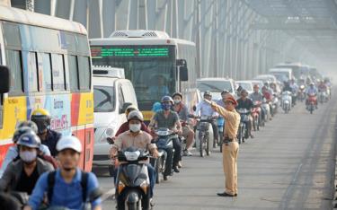 Bảo đảm trật tự, an toàn giao thông phục vụ nhu cầu đi lại của nhân dân dịp nghỉ lễ 30/4-01/5 và cao điểm du lịch hè 2024 - Ảnh: Chinhphu.vn